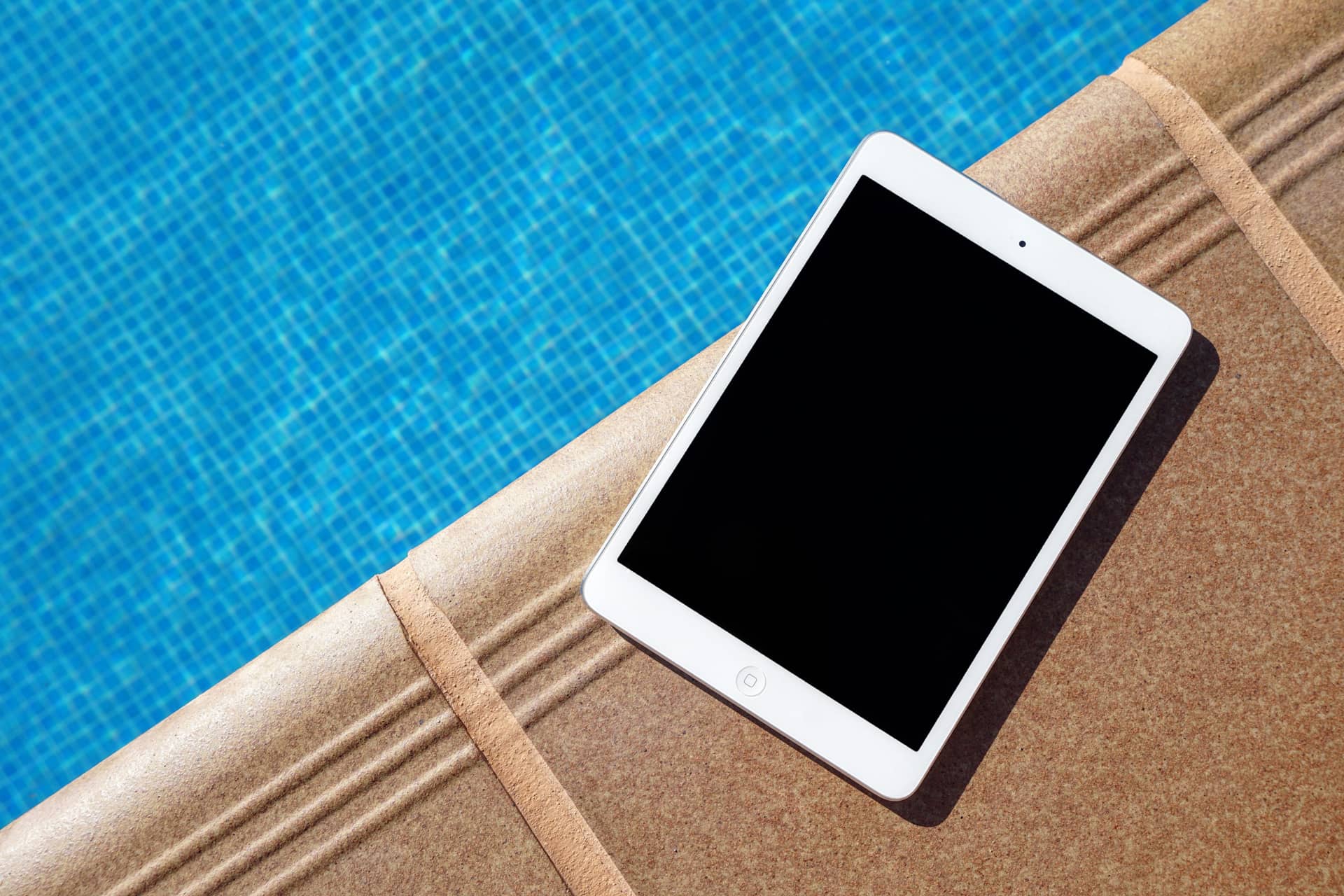 tablet by poolside